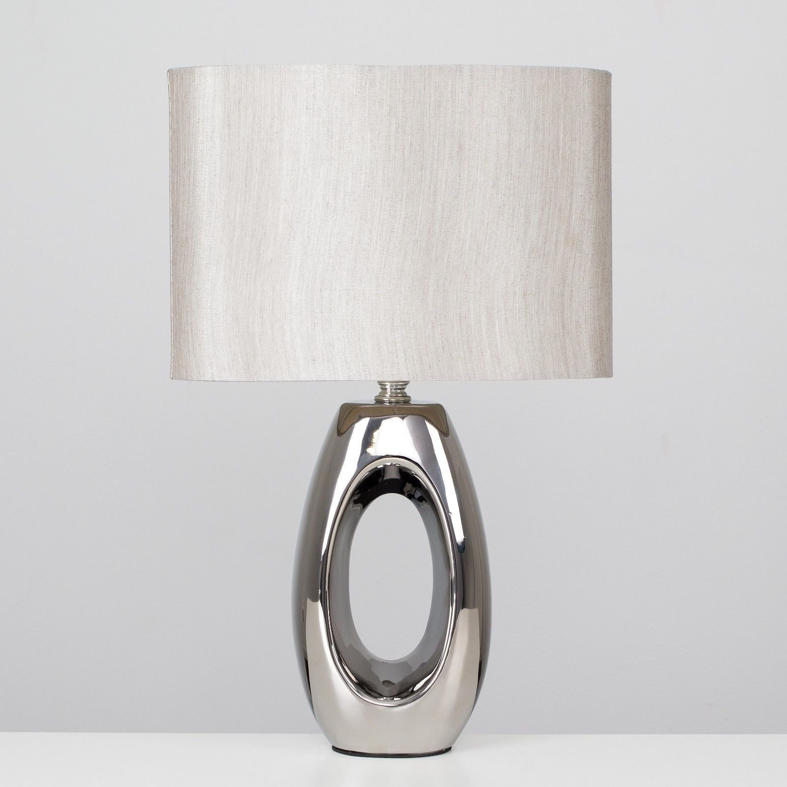Silver Oval Sculpture Lamp