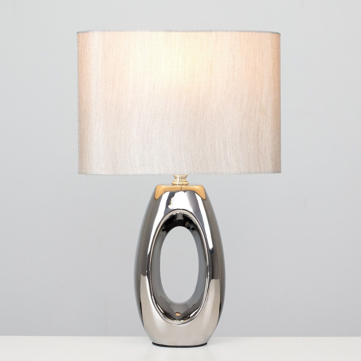 Silver Oval Sculpture Lamp